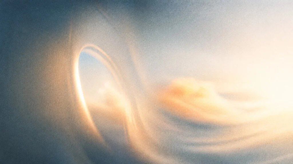 Abstract golden cloudscape seen through a curved aircraft window opening
