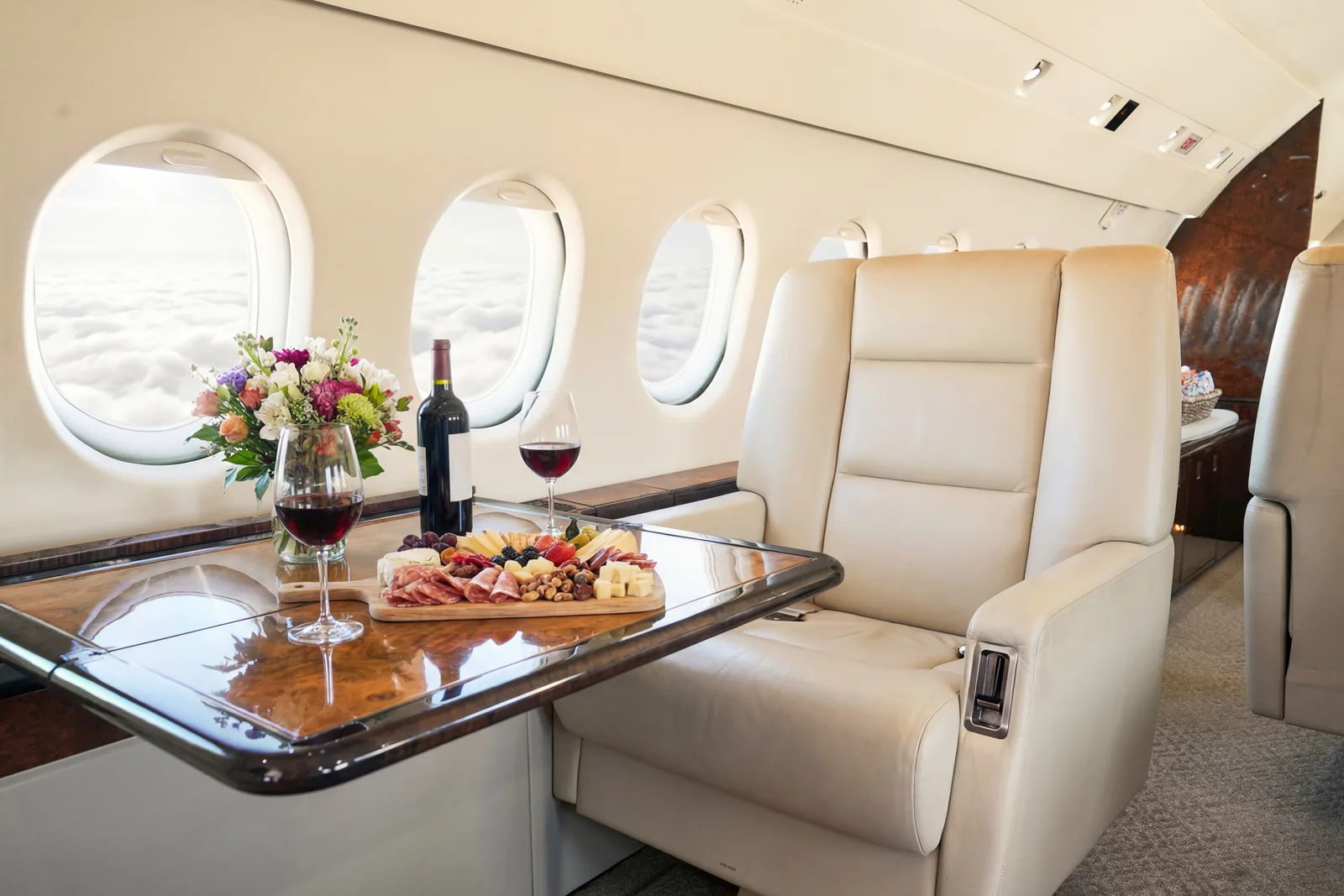 Falcon 900 cabin with table service setup